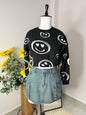 Black smiley sweater